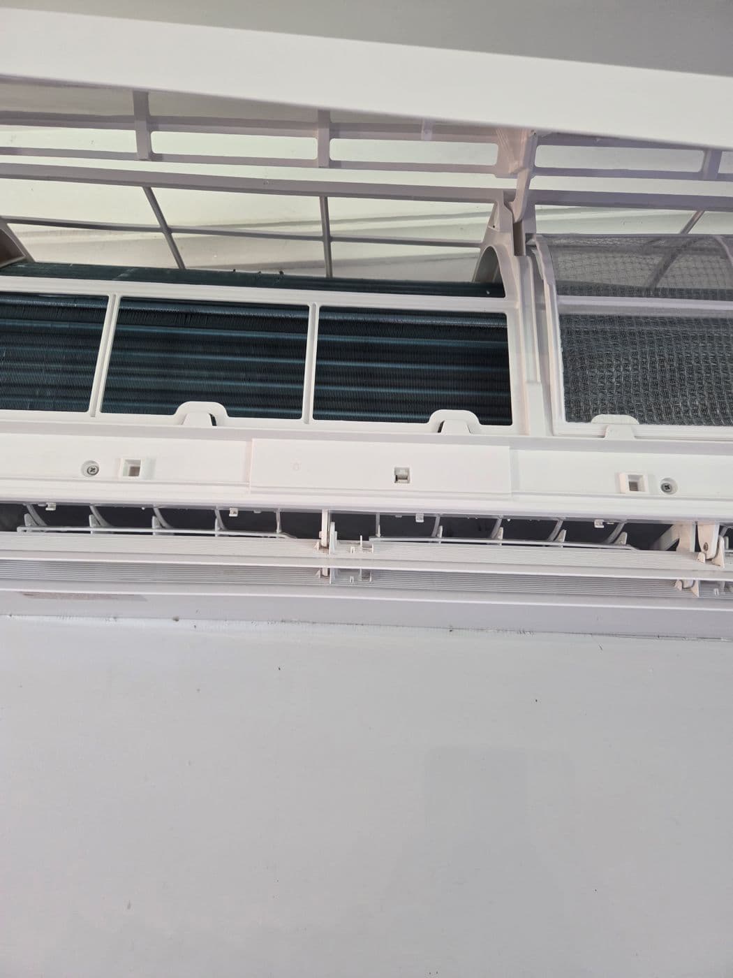 Split system indoor unit mounted in a living space