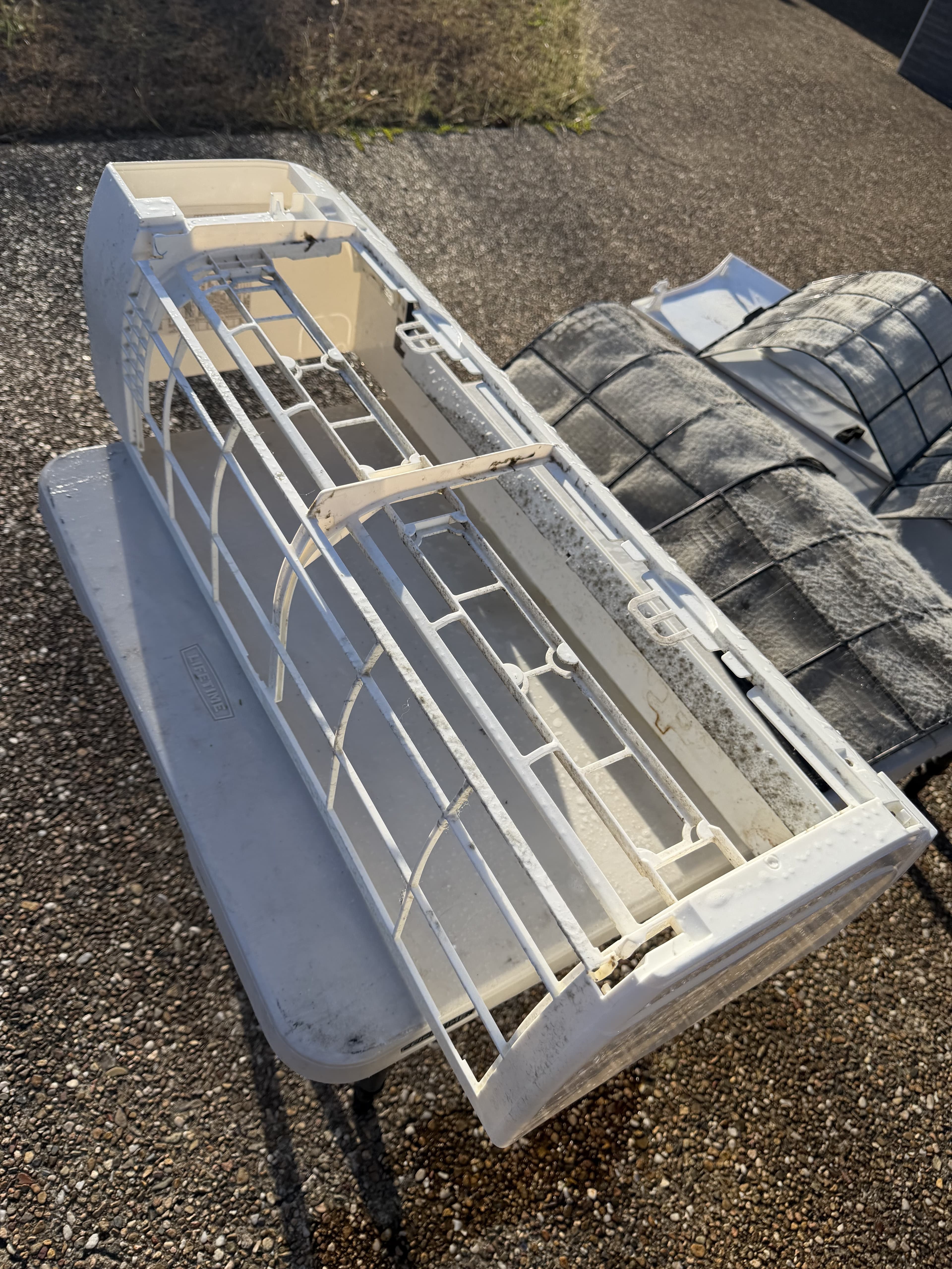 Air conditioner casing and filters dismantled ready for deep cleaning