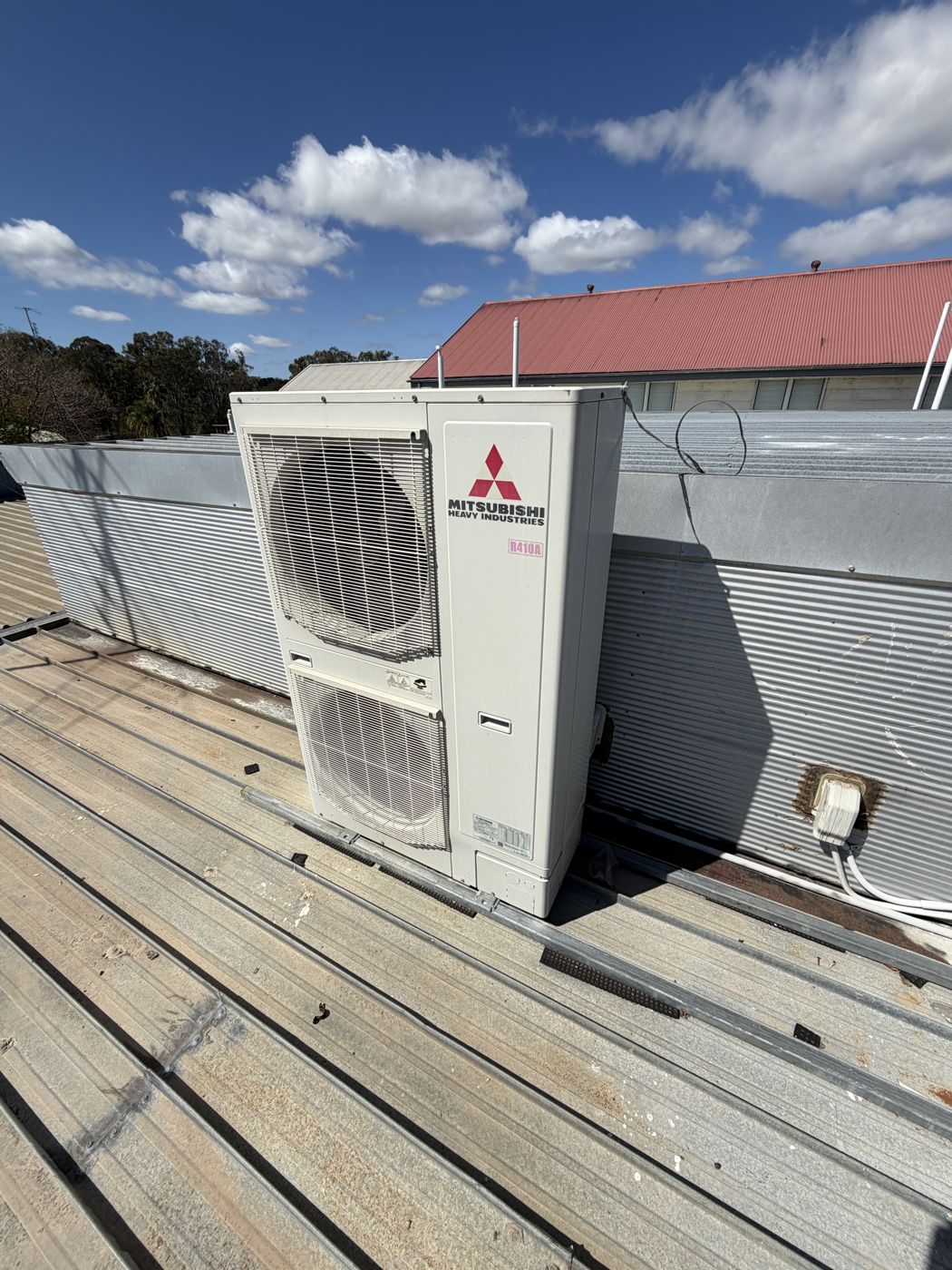 Rooftop air conditioning outdoor unit serviced by Chilled As Air Conditioning